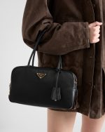 Re-Nylon and Leather Medium Top-Handle Bag With Padlock - Image 7